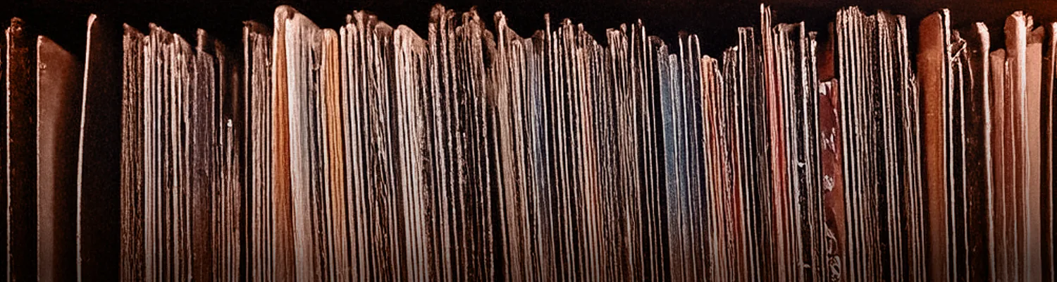 A row of vinyl records from the Big Youth catalog